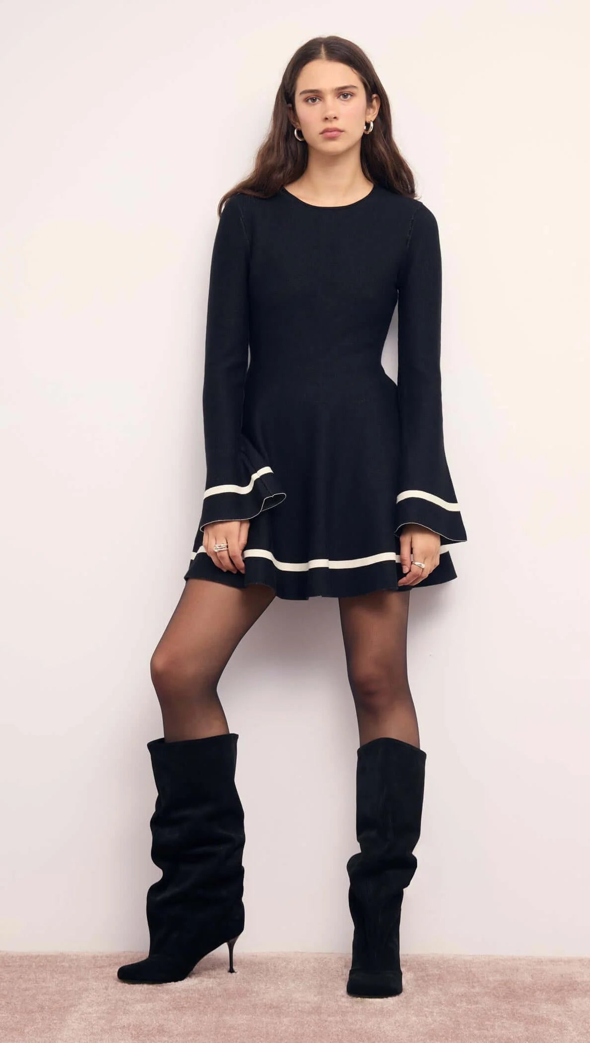 BLACK PEPLUM KNIT MINI DRESS WITH CONTRACT TRIM