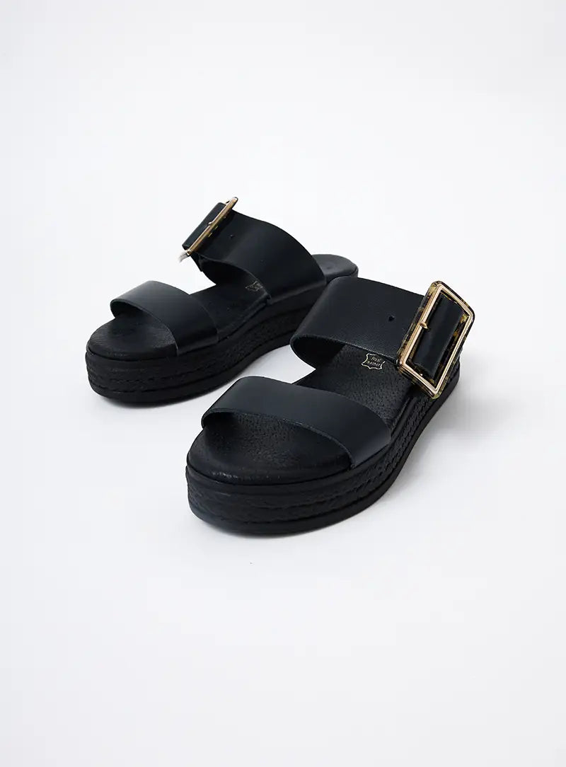 Thessaloniki Wedge mules with buckle detail